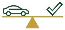 Car and check mark balanced on a gold bar